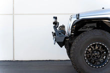 Load image into Gallery viewer, DV8 Offroad Fairlead Mounted Flip-Up License Plate Bracket - Additional View 7