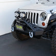 Load image into Gallery viewer, DV8 Offroad Fairlead Mounted Flip-Up License Plate Bracket - Additional View 8