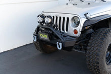 Load image into Gallery viewer, DV8 Offroad Fairlead Mounted Flip-Up License Plate Bracket - Additional View 8