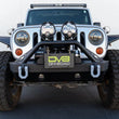 Load image into Gallery viewer, DV8 Offroad Fairlead Mounted Flip-Up License Plate Bracket - Additional View 9