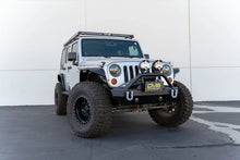 Load image into Gallery viewer, DV8 Offroad Fairlead Mounted Flip-Up License Plate Bracket - Additional View 12