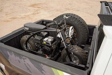 Load image into Gallery viewer, DV8 Offroad Truck Bed Universal Tire Carrier &amp; Accessory Mount - Side View