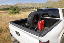 Load image into Gallery viewer, DV8 Offroad Truck Bed Universal Tire Carrier &amp; Accessory Mount - Back View