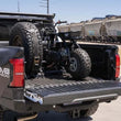 Load image into Gallery viewer, DV8 Offroad Truck Bed Universal Tire Carrier &amp; Accessory Mount - Installation View