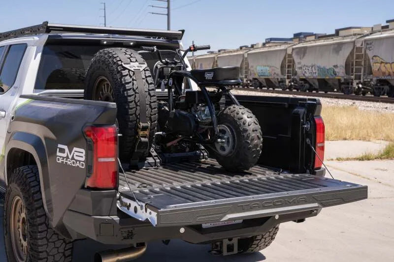DV8 Offroad Truck Bed Universal Tire Carrier & Accessory Mount - Installation View