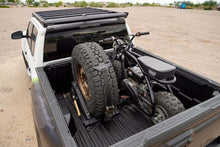Load image into Gallery viewer, DV8 Offroad Truck Bed Universal Tire Carrier &amp; Accessory Mount - Additional View 5