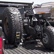 Load image into Gallery viewer, DV8 Offroad Truck Bed Universal Tire Carrier &amp; Accessory Mount - Additional View 9