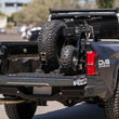 Load image into Gallery viewer, DV8 Offroad Truck Bed Universal Tire Carrier &amp; Accessory Mount - Additional View 10