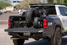 Load image into Gallery viewer, DV8 Offroad Truck Bed Universal Tire Carrier &amp; Accessory Mount - Additional View 10
