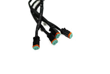 Load image into Gallery viewer, DV8 Offroad Universal 4-Way 1-DTP to 4-DTP Plug Harness - 15ft - Side View