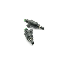 Load image into Gallery viewer, DeatschWerks 86-87 RX7 FC 1.3t 1000cc Low Impedance Top Feed Injectors - Installation View