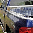 Load image into Gallery viewer, Deezee 02-09 Dodge Ram Bed Cap Wrap W/Stake Pockets Brite-Tread Aluminum 8Ft Bed - Side View