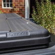 Load image into Gallery viewer, Deezee Universal Tool Box - Specialty Crossover Toolbox Plastic Mid Size - Installation View