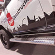 Load image into Gallery viewer, Deezee Universal Tubes - 6In Oval - Black Tread Aluminum (RegCab) - Side View