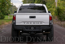 Load image into Gallery viewer, Diode Dynamics 16-21 Toyota Tacoma C2 Pro Stage Series Reverse Light Kit - Installation View