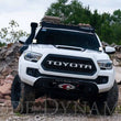 Load image into Gallery viewer, Diode Dynamics 16-21 Toyota Tacoma Stage Series 2in LED Ditch Light Kit - Sport Yellow Combo - Side View