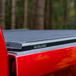 Load image into Gallery viewer, EGR 19-23 Chevrolet Silverado RollTrac Electric Retractable Bed Cover - Side View