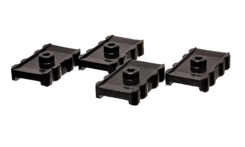 Energy Suspension 73-78 Chrysler Black Leaf Spring Isolator Set w/ Ribbed Sides - Main Product View