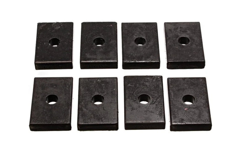 Energy Suspension Pad - Firm - 2-7/16in L x 1-5/8in W x 15/32 ID x 1/2in H - Black - Side View