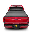 Load image into Gallery viewer, Extang 21-23 Ford F-150 (5ft. 7in. Bed) Solid Fold ALX - Back View