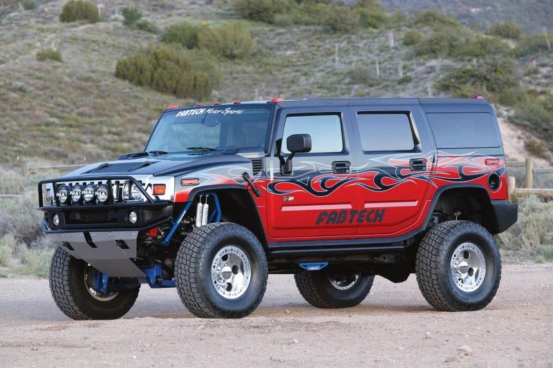 Fabtech 03-08 Hummer H2 Suv/Sut 4WD w/Rr Coil Springs 6in Perf Sys w/Perf Shks - Side View