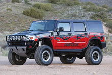 Load image into Gallery viewer, Fabtech 03-08 Hummer H2 Suv/Sut 4WD w/Rr Coil Springs 6in Perf Sys w/Perf Shks - Back View