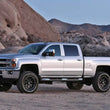 Load image into Gallery viewer, Fabtech 11-19 GM 2500HD 2WD/4WD 4in Basic Sys w/Stealth Shks - Side View
