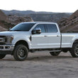 Load image into Gallery viewer, Fabtech 17-20 Ford F250/350 4WD SD 2.5in Basic System Box Kit