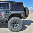Load image into Gallery viewer, Fabtech 18-21 Jeep JL 4WD Rear Steel Tube Fenders - Textured Black - Back View