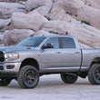Load image into Gallery viewer, Fabtech 19-22 Ram 2500 4WD 5in Basic Kit w/Stealth - Side View