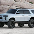 Load image into Gallery viewer, Fabtech 2015-21 Toyota 4Runner 4WD 6in Basic Sys w/Perf Shks - Side View