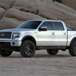 Load image into Gallery viewer, Fabtech 4in Lift System - Component Box 1 fits 2009-2014 Ford F-150 / F150 4WD