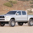 Load image into Gallery viewer, Fabtech 6in Coilover Spacer Kit fits 2010-2024 Toyota 4RUNNER / Toyota FJ / 2007-2014 Toyota FJ Cruiser / 2005-2020 Toyota...