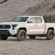 Load image into Gallery viewer, Fabtech (w/o AVS) 1.5in Leveling Kit fits 2024-2025 Toyota Tacoma 4WD - Back View