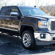 Load image into Gallery viewer, Fishbone Offroad 07-18 Chevrolet Silverado 1500/2500/3500 Crew Cab Oval Side Steps - Black Textured - Back View