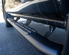 Load image into Gallery viewer, Fishbone Offroad 07-18 Chevrolet Silverado 1500/2500/3500 Crew Cab Oval Side Steps - Black Textured - Installation View