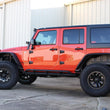 Load image into Gallery viewer, Fishbone Offroad 07-18 Jeep JK 4 Door Wrangler JK Steel Rock Sliders - Blk Textured Powdercoat - Back View