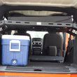 Load image into Gallery viewer, Fishbone Offroad 07-18 Jeep Wrangler JK 4 Door Fisbone Offroad Interior Storage Rack - Additional View 6
