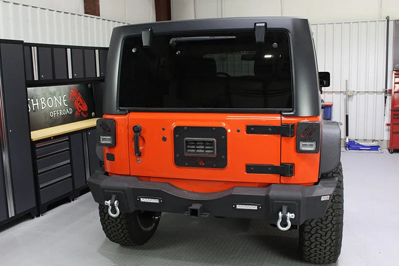 Fishbone Offroad 07-18 Jeep Wrangler JK - Black Textured Powdercoat Tail Light Covers - Side View
