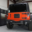 Load image into Gallery viewer, Fishbone Offroad 07-18 Jeep Wrangler JK - Black Textured Powdercoat Tail Light Covers - Installation View