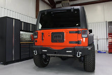 Load image into Gallery viewer, Fishbone Offroad 07-18 Jeep Wrangler JK - Black Textured Powdercoat Tail Light Covers - Installation View