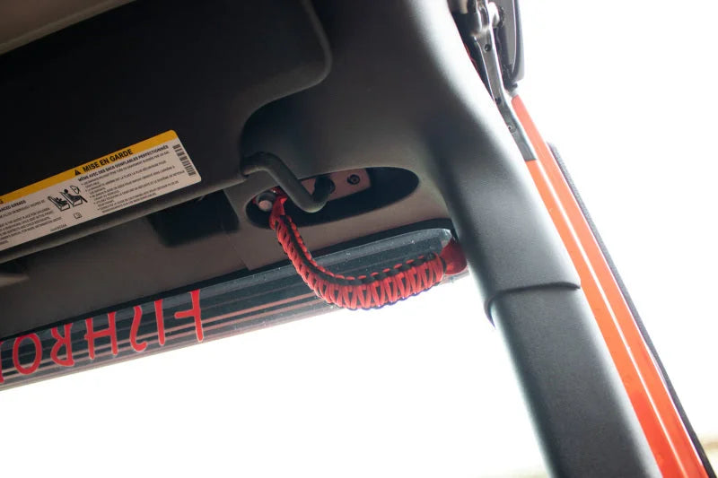 Fishbone Offroad 07-18 Wrangler JK A Pillar Sound Bar Red Paracord Grab Handles - Side View
