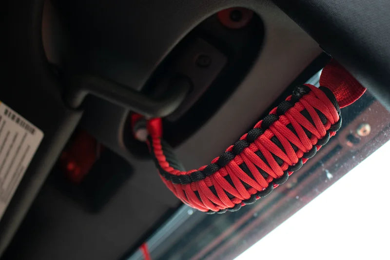 Fishbone Offroad 07-18 Wrangler JK A Pillar Sound Bar Red Paracord Grab Handles - Installation View