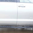 Load image into Gallery viewer, Fishbone Offroad 07-21 Toyota Tundra Double Cab Oval Side Steps - Black Textured - Installation View