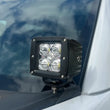 Load image into Gallery viewer, Fishbone Offroad 2015+ Ford F150 / 2017+ Raptor Pod Light Bracket - Black - Installation View