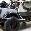 Load image into Gallery viewer, Fishbone Offroad 2018+ Jeep Wrangler JL 2/4 Door - Black Quarter Panel Chip Guards - Side View