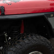 Load image into Gallery viewer, Fishbone Offroad 97-06 Jeep Wrangler Front Fenders Paintable Mesh Upgrade - Back View