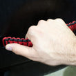 Load image into Gallery viewer, Fishbone Offroad 97-06 Jeep Wrangler Paracord Door Handles - Black/Red - Installation View