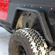 Load image into Gallery viewer, Fishbone Offroad 97-06 Jeep Wrangler TJ Steel Tube Fenders Front 3In Flare - Blk Textured Powdercoat - Additional View 5