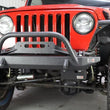 Load image into Gallery viewer, Fishbone Offroad 97-06 Jeep Wrangler TJ Steering Box Skid Plate - Black Textured Powdercoat - Installation View